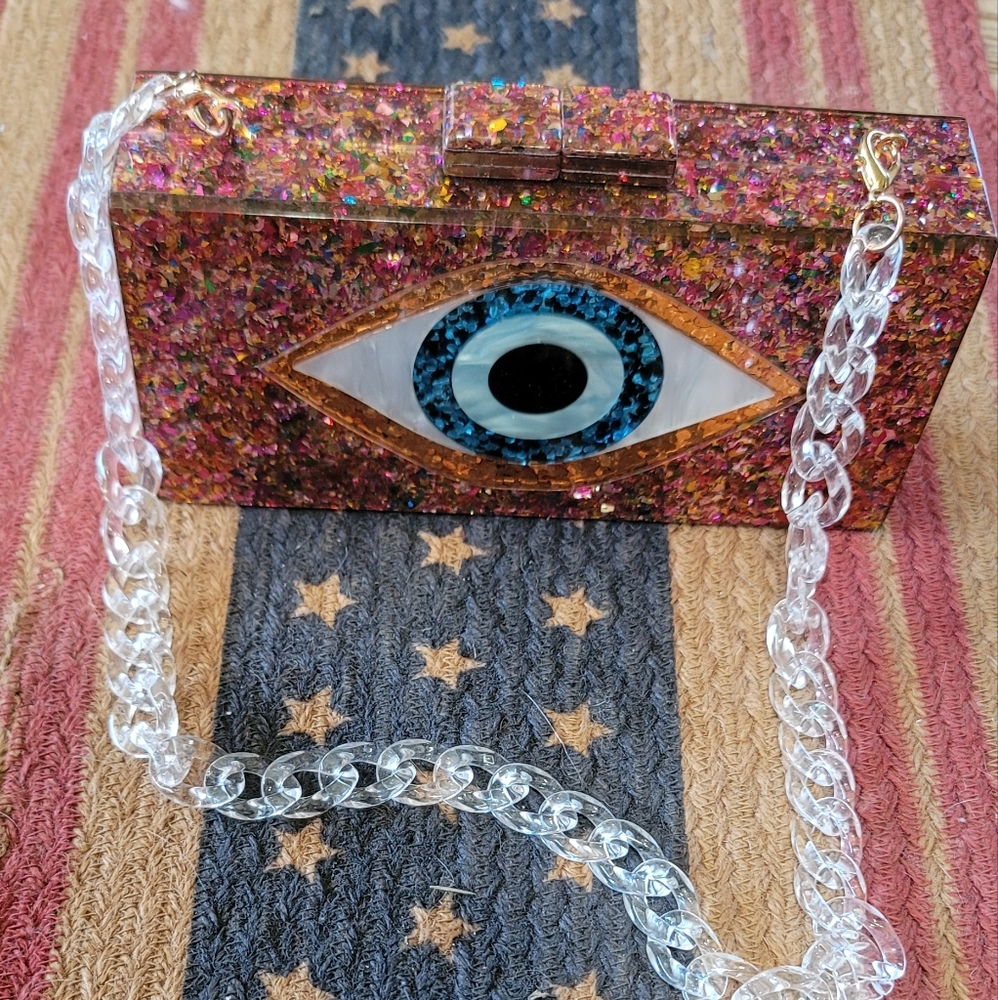 Unique glitter eye purse.